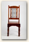 Kolonialne krzesÅ‚o, z litego drewna egzotycznego, toczone nogi, w oparciu elementy kute  » Click to zoom ->